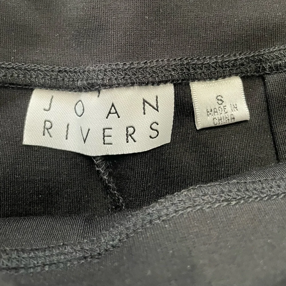 Joan Rivers women’s full length poll- on black pants size small, 66% Rayon.